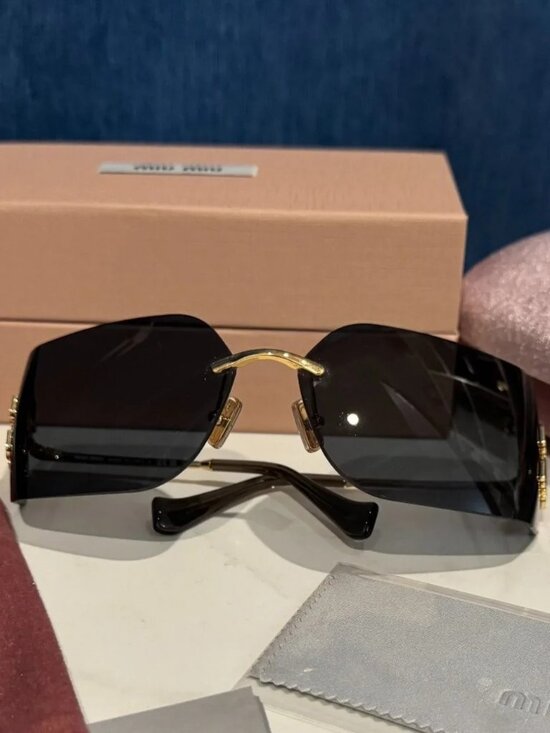 ✨ Miu Miu Rimless Black Sunglasses with Gold Hardware main image 2